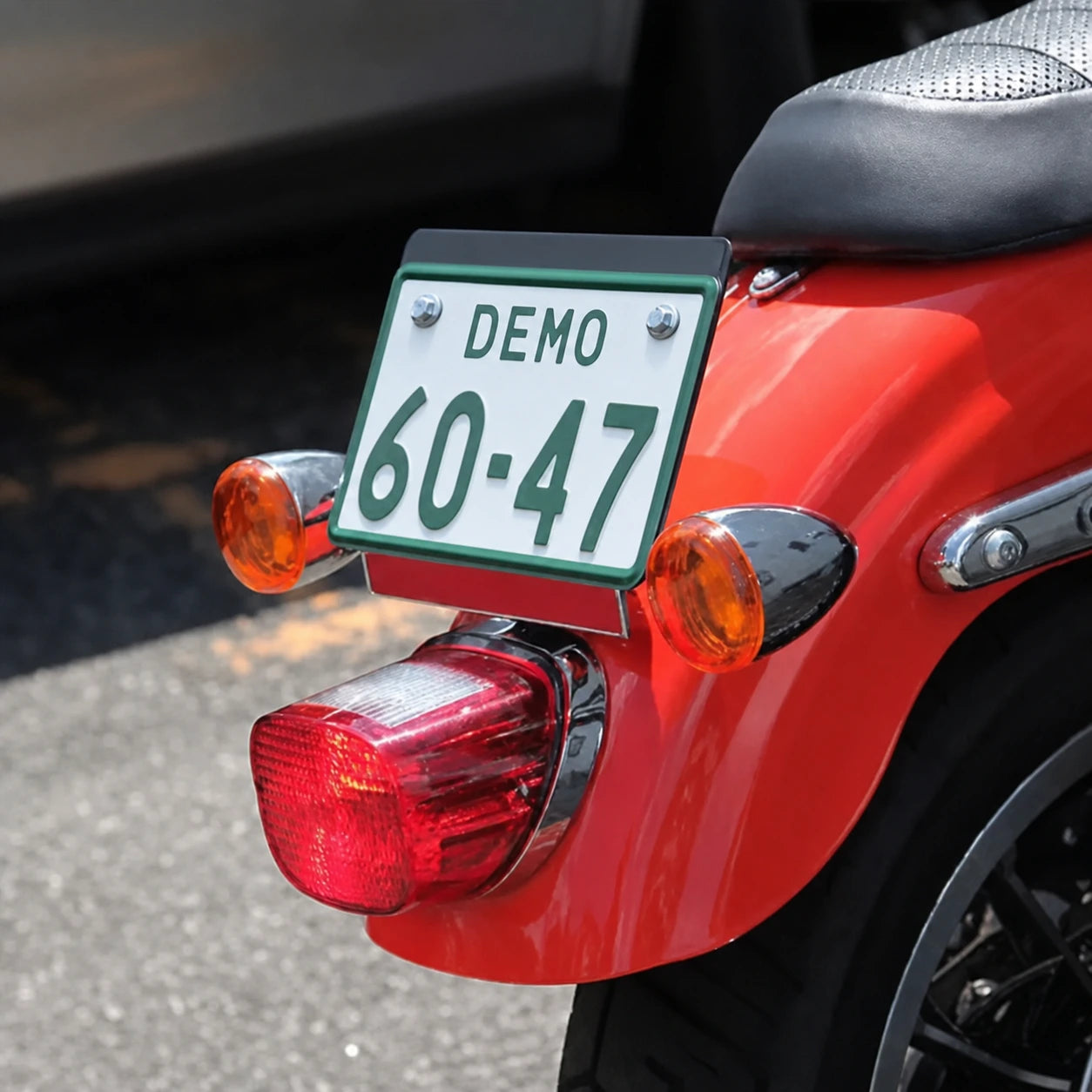 Harley rear turn signal and license plate relocation bracket installed