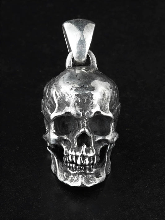 Heavy anatomical skull sterling silver biker pendant, front view