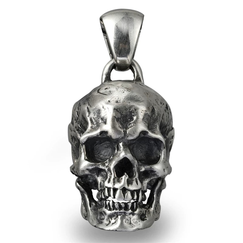 Heavy anatomical skull sterling silver biker pendant on white background