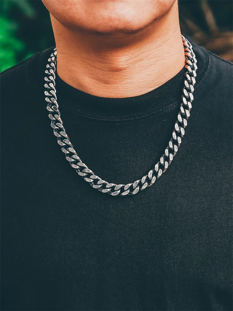Heavy silver Cuban biker necklace worn view