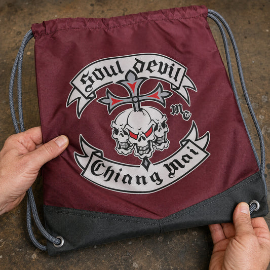 Heavy polyester motorcycle club drawstring bag with reinforced seams, cords and eyelets.