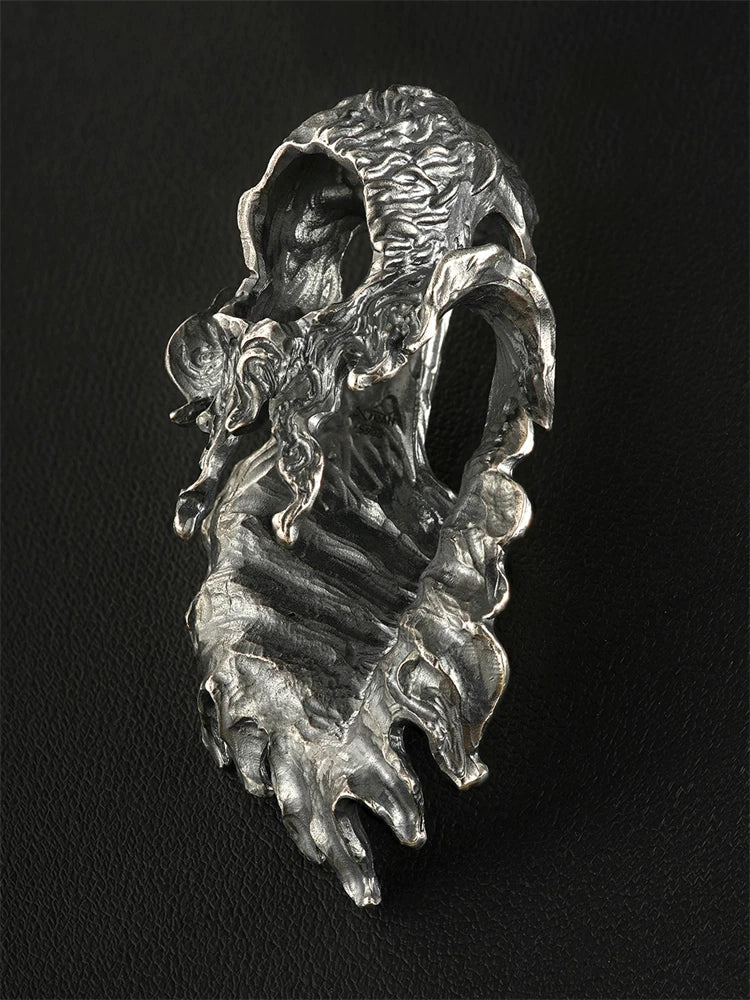 Openwork cloak sterling silver pendant angled view