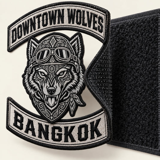 Hook-backed chest patch aligned with loop panel for a motorcycle club, shown at removable patch demonstration board.
