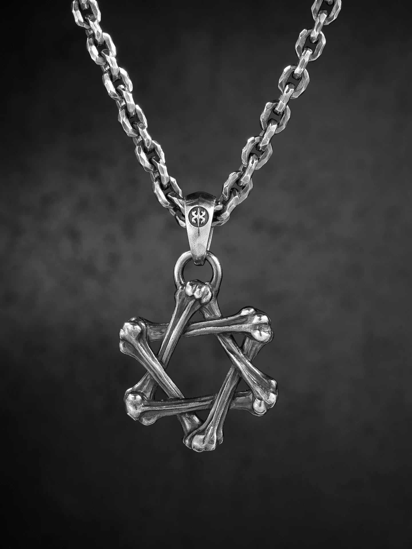 Bone hexagram sterling silver biker pendant shown on chain