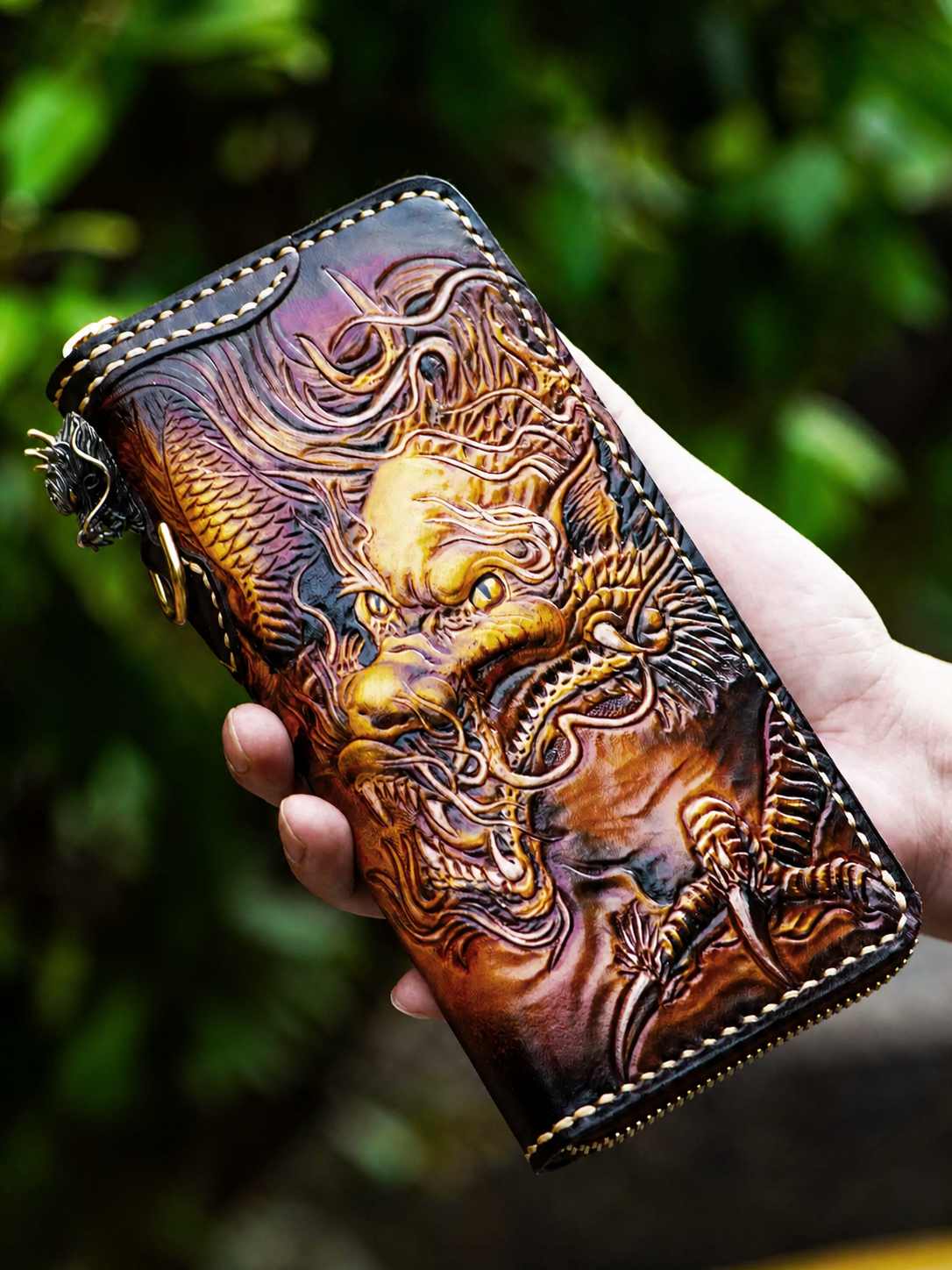 dragon side of a hand-carved full-grain leather biker wallet