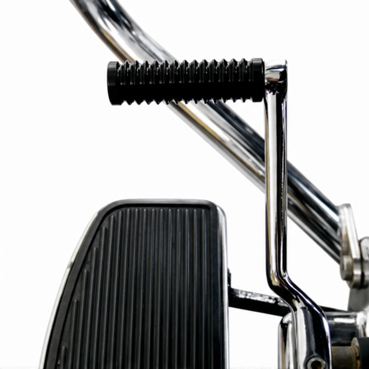 Black extended shift peg installed on a Harley motorcycle shift lever