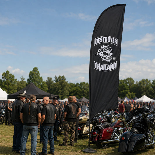 Large Event Feather Flags: custom motorcycle club feather flag shown in large motorcycle festival field with a mature club crew and rows of touring V-twins.