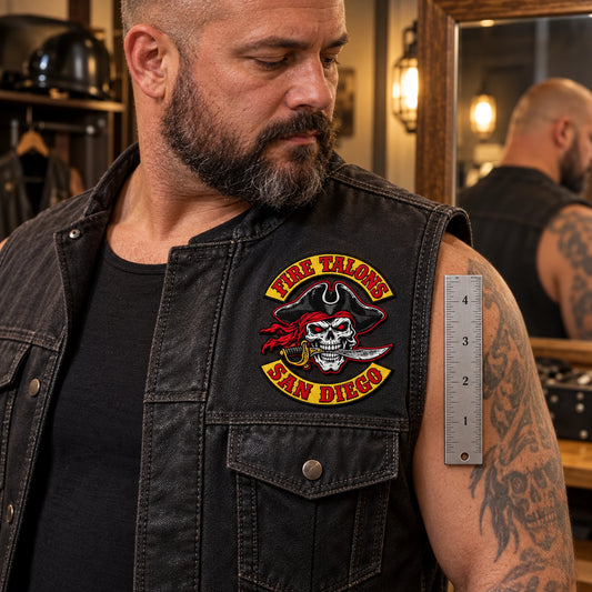 4-inch detailed emblem patch on a roomy vest panel for a motorcycle club, shown at clubhouse mirror fitting area.