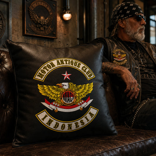 Leather-look motorcycle club cushion complementing a premium clubhouse interior.