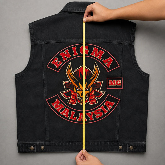 Usable back height measured vertically on a denim motorcycle vest from collar zone to lower edge.