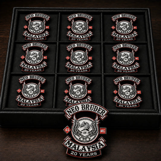 Matching Neo Bruder motorcycle club 20-year anniversary badges arranged as one official member edition.