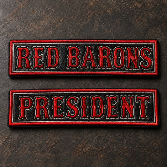 Tasteful metallic silver and gold thread details on traditional motorcycle club name bars, restrained premium finish, showing custom motorcycle club name bar patch options.