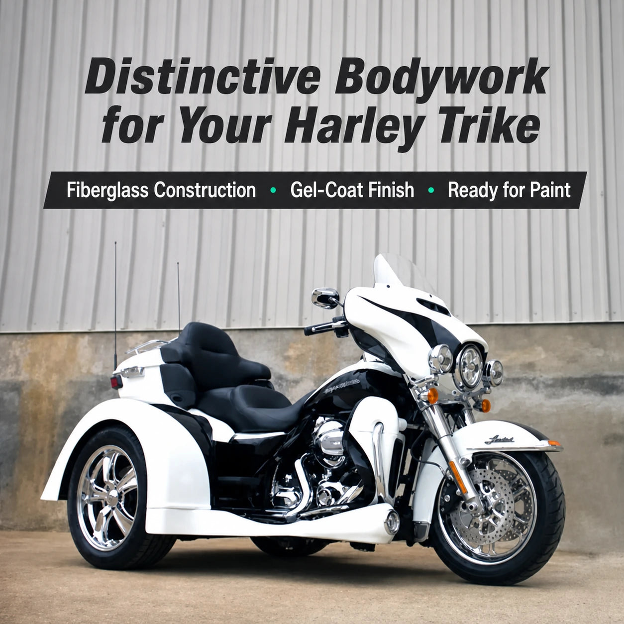 White Harley trike bodywork with fiberglass side panels ready for paint