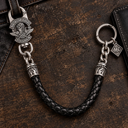 Custom motorcycle club leather and metal chain shown as a physically plausible braided black leather and metal chain sections.