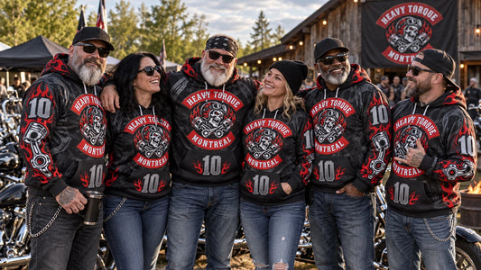 Motorcycle club members wearing custom anniversary all-over print hoodies at an outdoor chapter gathering.