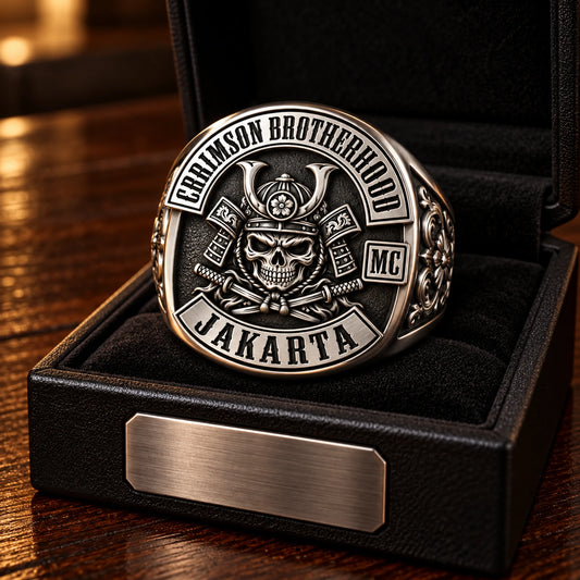 Motorcycle club anniversary ring displayed in a black presentation box with a blank milestone plaque.