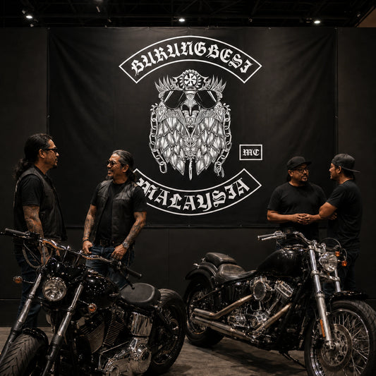 A custom motorcycle club banner creating a strong display behind polished bikes at an exhibition.