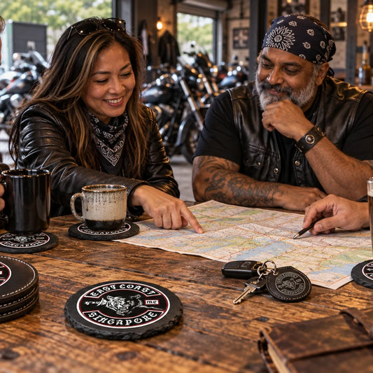 Motorcycle club clubhouse merchandise arranged on a shared table for members.