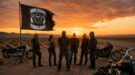 Motorcycle club riders gathered at sunset with their custom swallowtail flag after a V-twin group ride.