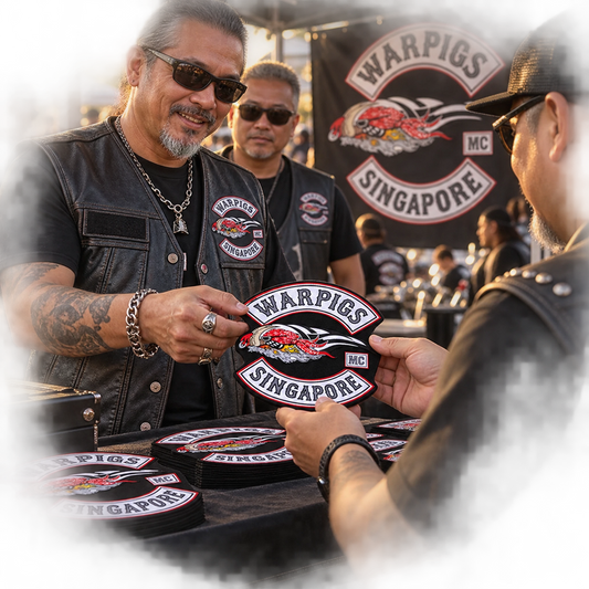 Solid event patches issued to riders shown for a custom motorcycle club patch system in outdoor rally registration.