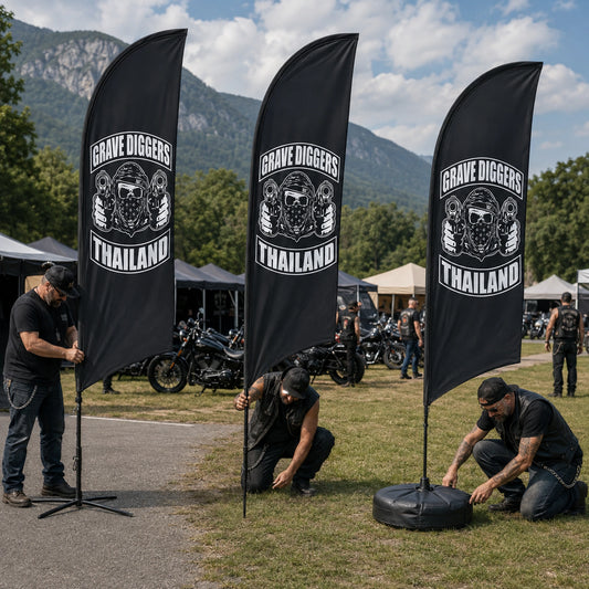 Pole And Base Options: custom motorcycle club feather flag shown in rally setup crew on mixed asphalt and grass surfaces.