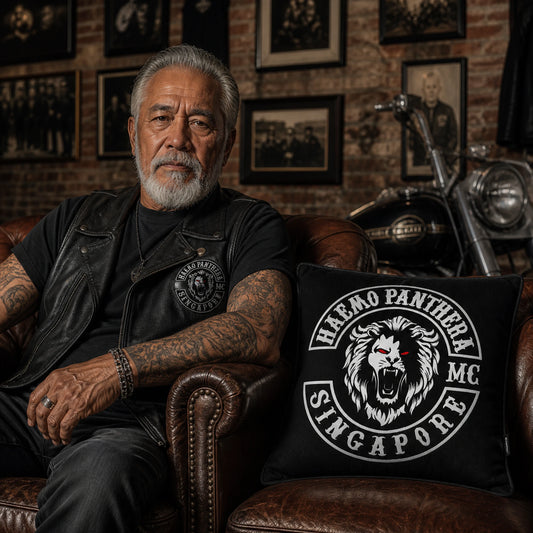 Veteran club founder displays a custom cushion featuring approved heritage artwork.