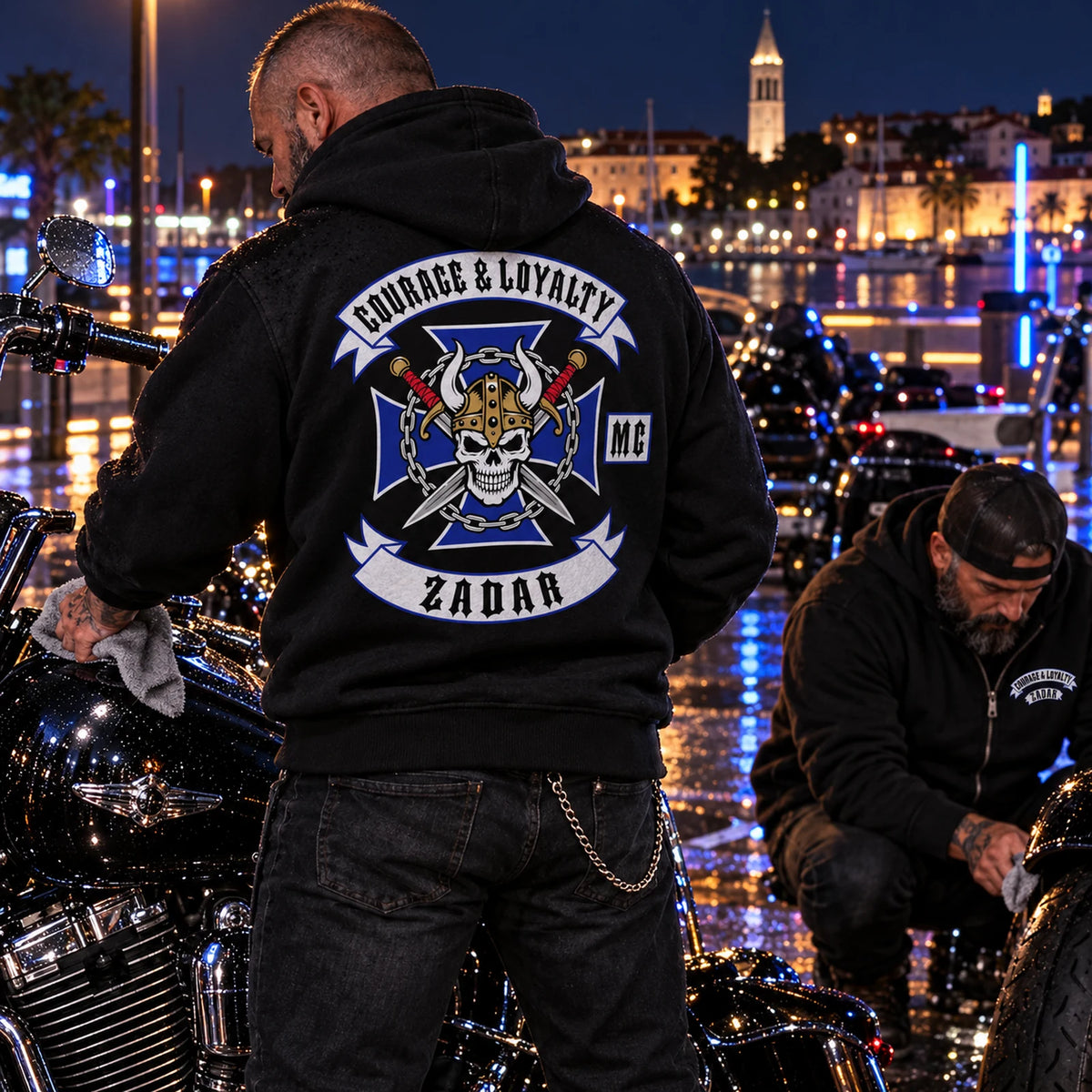 Black hoodie color in real riding use featuring a custom motorcycle club hoodie with authorized club artwork.