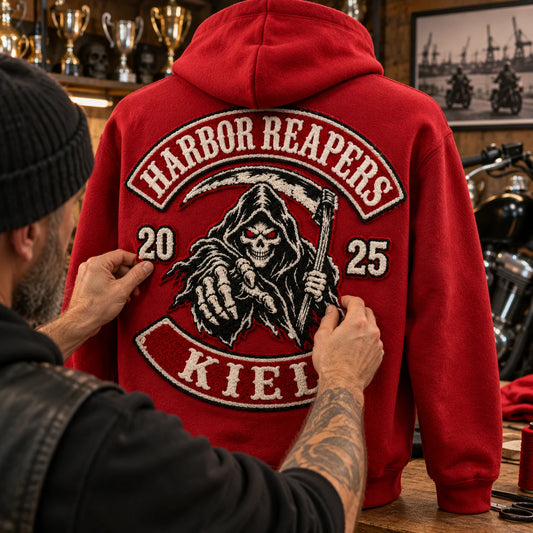 Chenille anniversary embroidery featuring a custom motorcycle club hoodie with authorized club artwork.