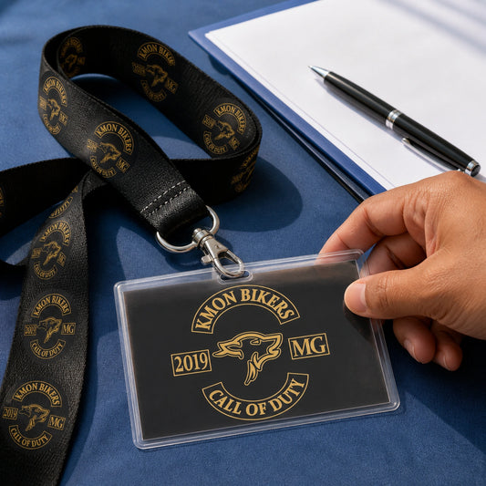 A club-logo lanyard and landscape event pass placed beside a rally registration packet.
