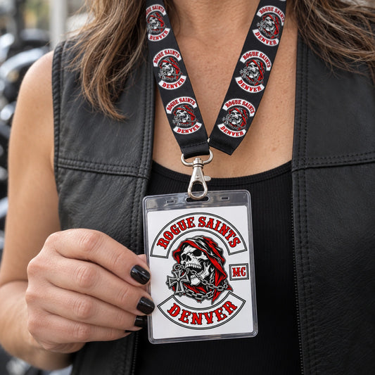A member holding a portrait credential attached to a matching motorcycle club lanyard.