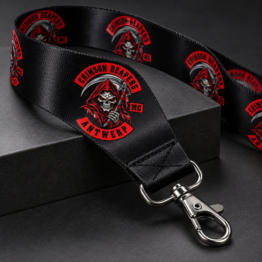 A nylon motorcycle club lanyard showing a lustrous surface, printed logo and connected trigger hook.
