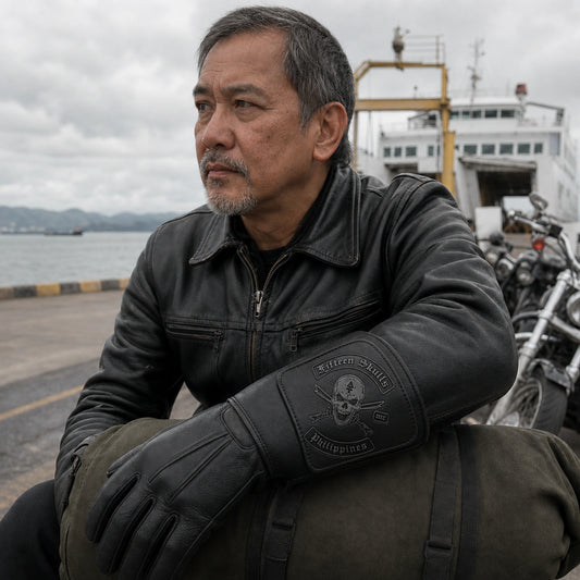 A black gauntlet motorcycle club glove uses a thin tonal leather patch on its extended cuff for the complete supplied emblem.