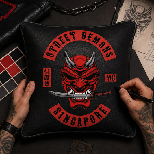 Custom motorcycle club cushion reproducing an approved logo and club color scheme.