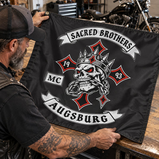 Motorcycle club members use a custom rectangular flag for club logo customization in a realistic American V-twin setting.