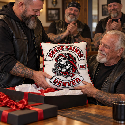A longtime motorcycle club member receives a custom club-logo cushion as a presentation gift.
