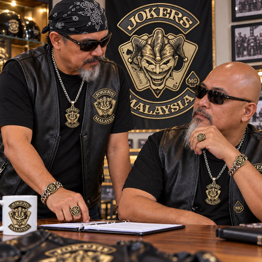 Chapter officers wearing coordinated custom motorcycle club metal pieces with role personalization.