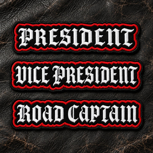 Motorcycle club officer title bars for President, Vice President and Road Captain, consistent traditional construction arranged on worn leather, showing custom motorcycle club name bar patch options.