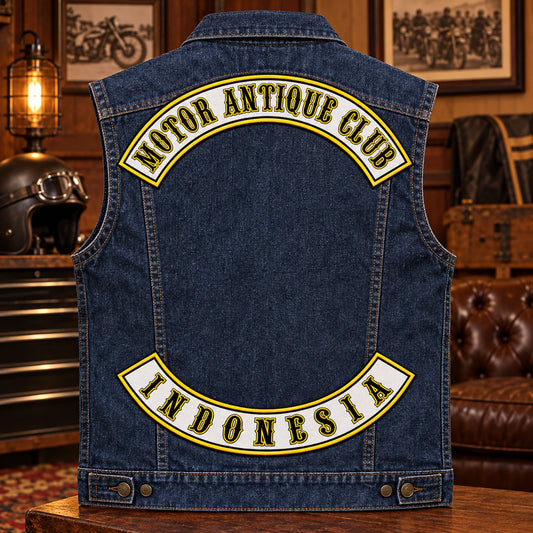 Complete indigo denim motorcycle vest displaying Old English lettering on custom motorcycle club rocker patches.