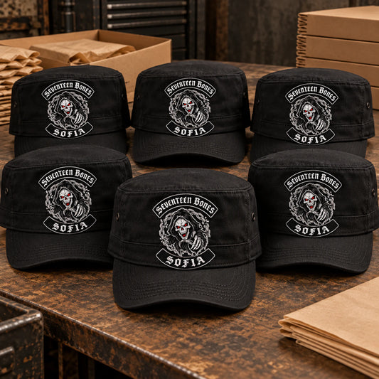 Finished production batch of black military cadet caps ready for final inspection for a motorcycle club.