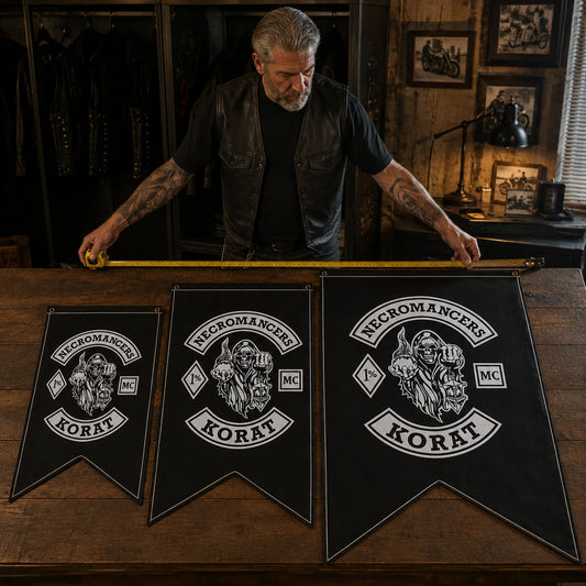 Club quartermaster comparing three custom swallowtail flag sizes for different display spaces.