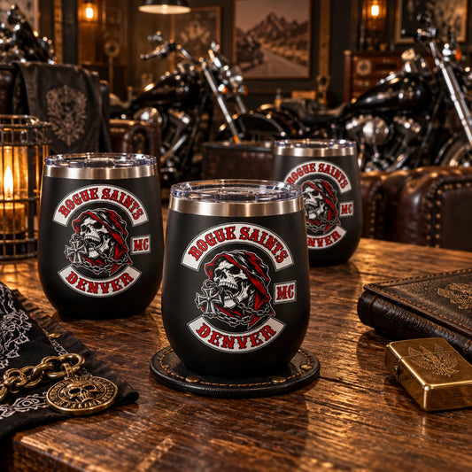 Commemorative motorcycle club anniversary tumblers at a celebration.