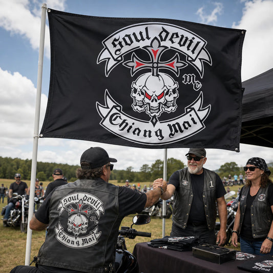 Motorcycle club members use a custom rectangular flag for motorcycle rally events in a realistic American V-twin setting.
