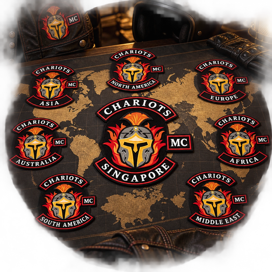 Matched chapter patches for different regions shown for a custom motorcycle club patch system in world map packing table.
