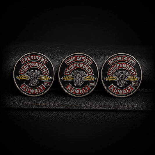 Coordinated motorcycle club officer pin displayed on a riding vest.