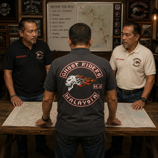 Ghost Riders officers in charcoal and cream polos display PRESIDENT and ROAD CAPTAIN chest titles, club emblems, and a large back logo.