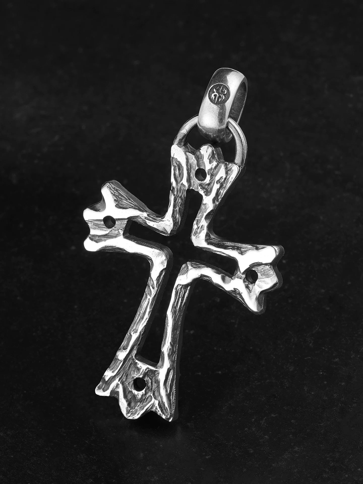 Openwork bone cross sterling silver biker pendant, angled view