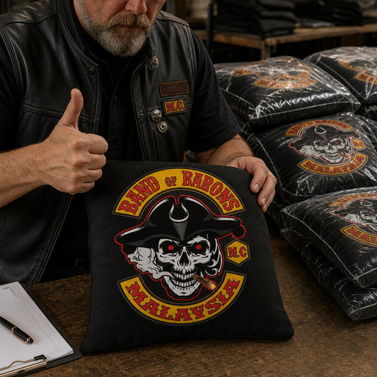 Club officer approves a motorcycle club logo cushion before production.