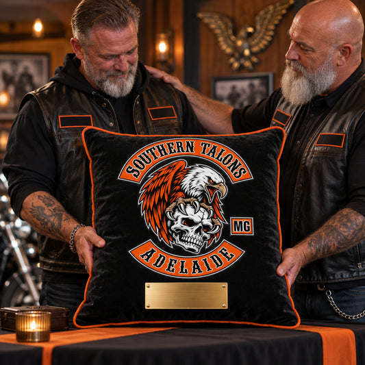 Motorcycle club officers present a personalized custom club-logo cushion.