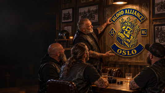 Personalized motorcycle club metal wall sign presented to members in a warm clubhouse setting.