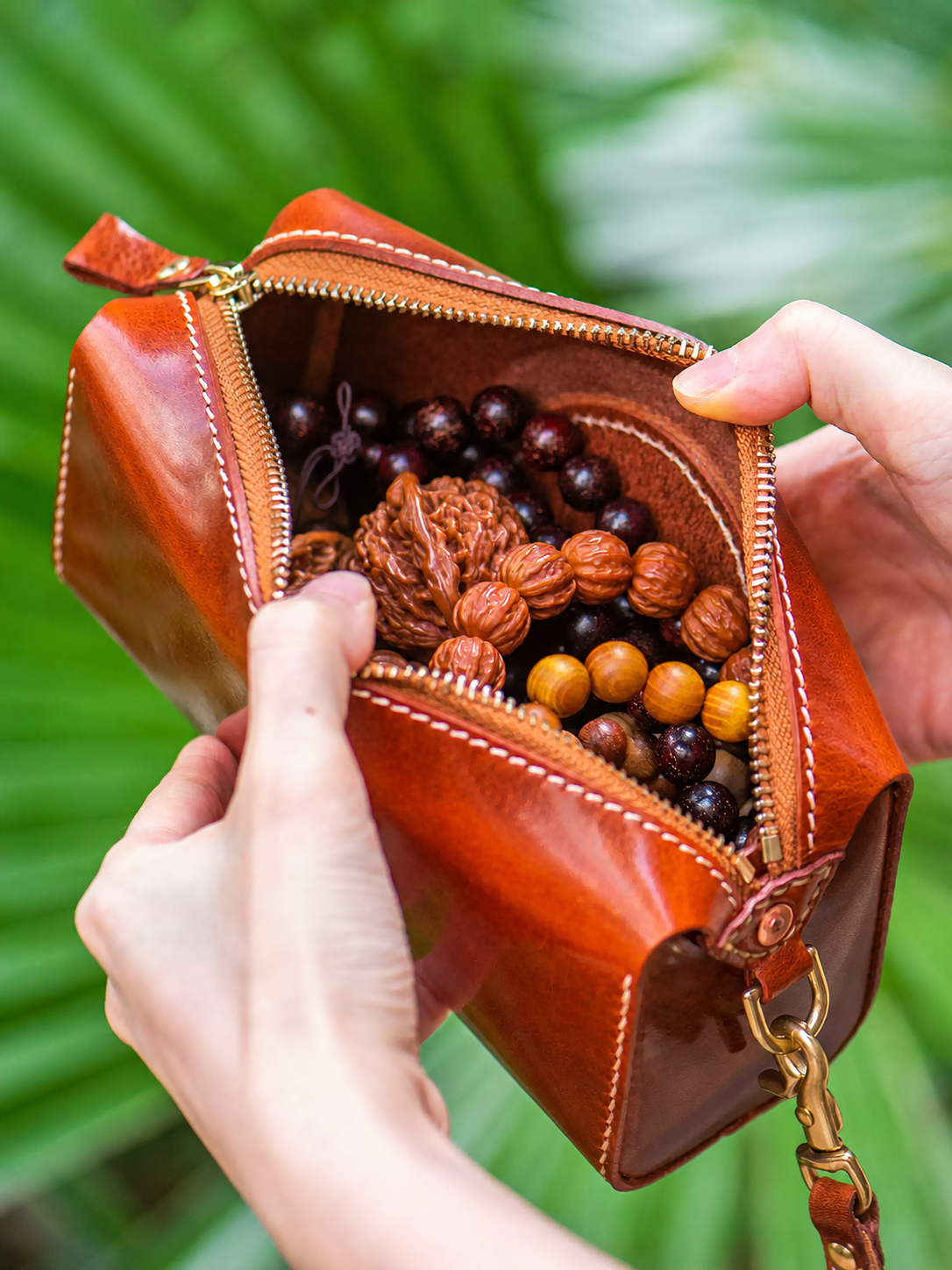 open Pixiu leather biker wallet holding collectible beads